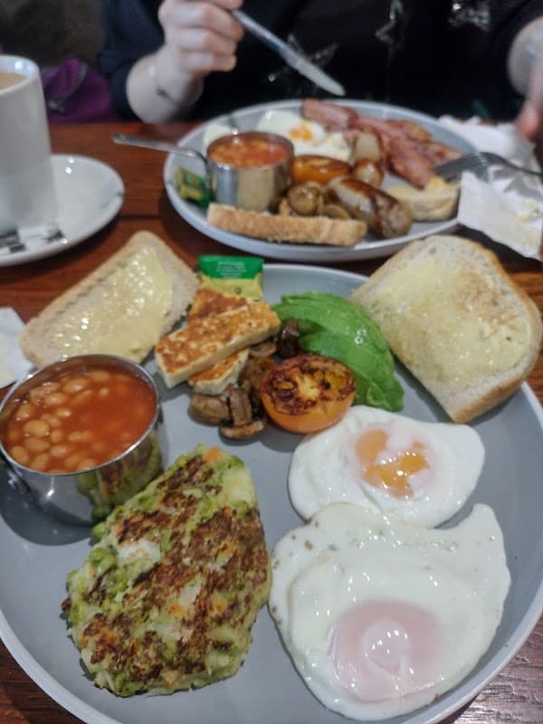 A cooked breakfast with poached eggs at Olives Cafe, Purbrook