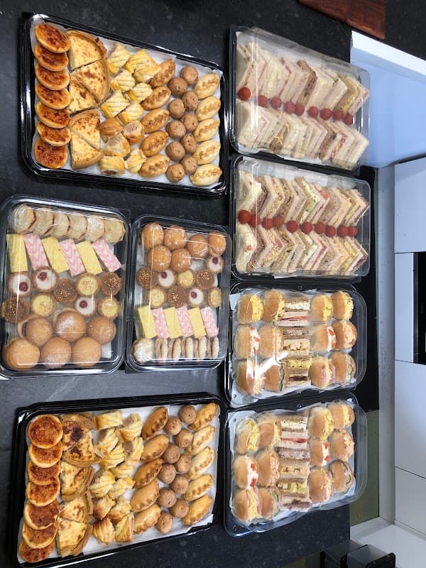 Trays of pastries and doughnuts at The Village Bakery, London Road, Widley