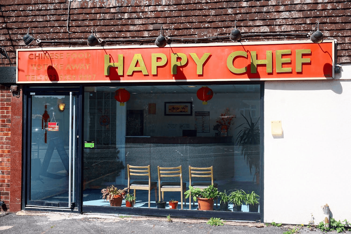 Happy Chef Chinese takeaway shopfront with red sign on Drift Road, Clanfield