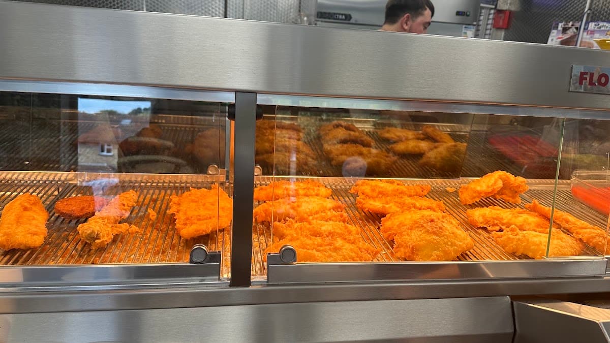 Freshly battered fish on the counter at Sam’s Fish Bar, Cowplain, the highest-rated chippy in the Waterlooville area