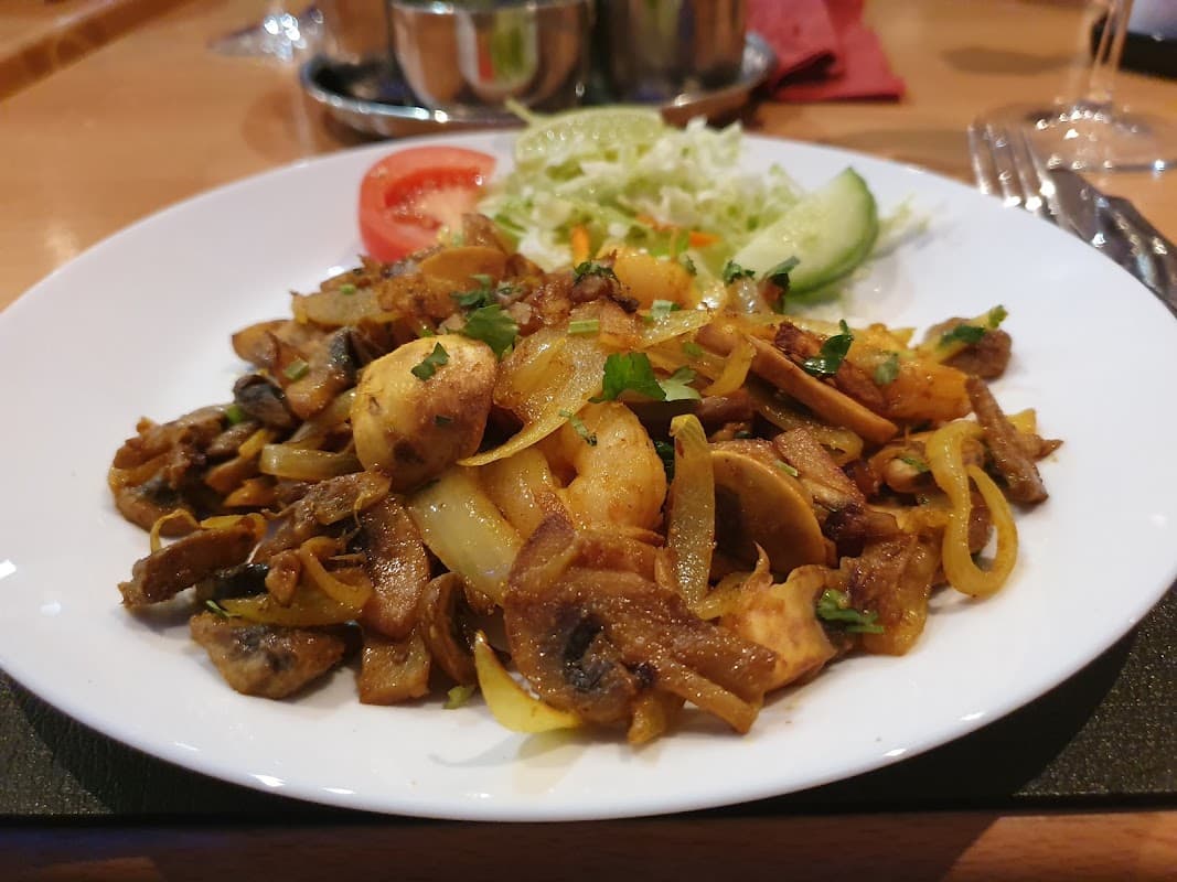 A stir-fried curry with salad at Paprika, Horndean Precinct