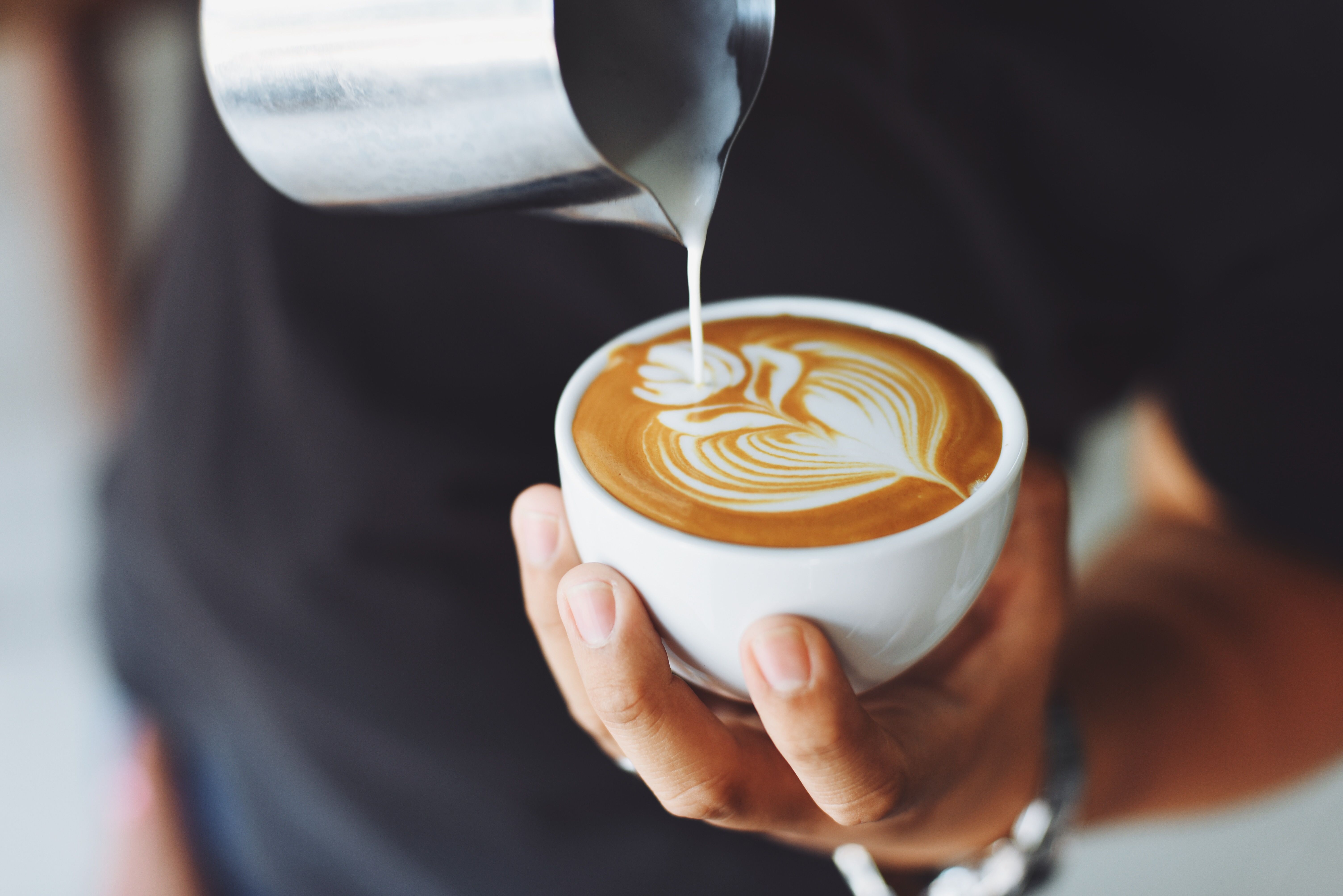 Coffee and cake on a cafe table, representative image