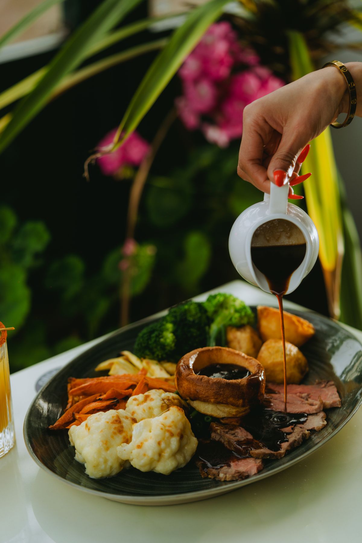 A traditional roast dinner plate with beef, Yorkshire pudding and vegetables, representative image
