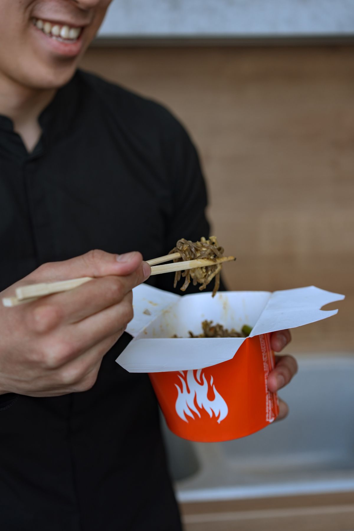 Chinese takeaway food in a container, representative image